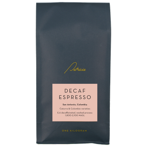Decaf Espresso coffee package with 'Patricia' branding on a pink background