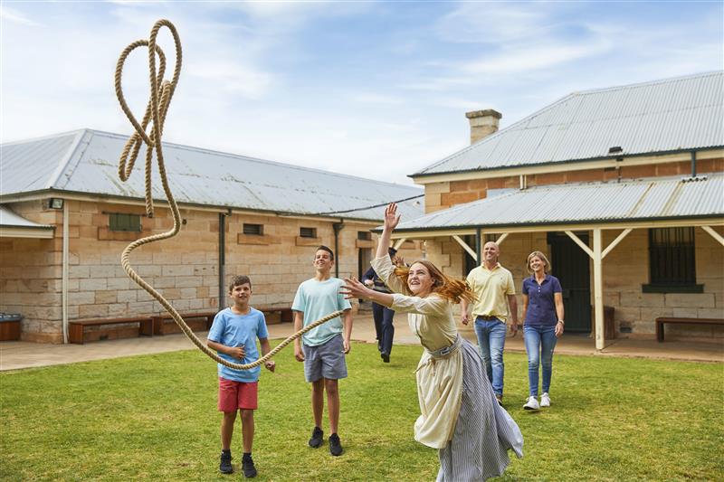 Family trying the rope toss at Old Dubbo Gaol — a Great Big Adventure Pass experience 2.1 km from Bluegum Dubbo